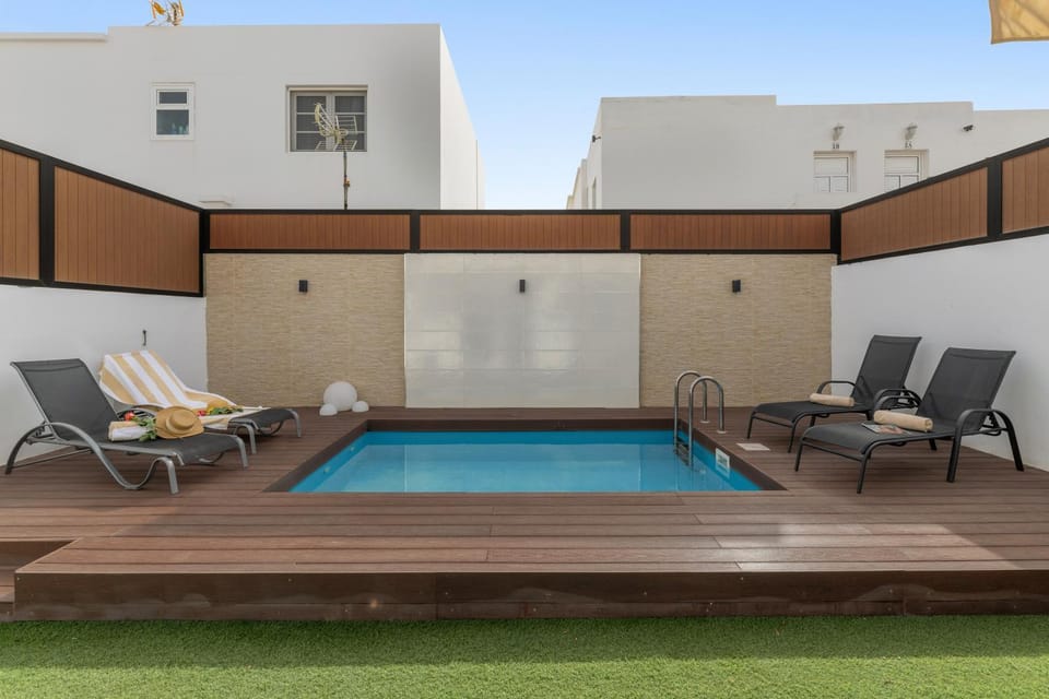 Property building, Living room, Swimming pool