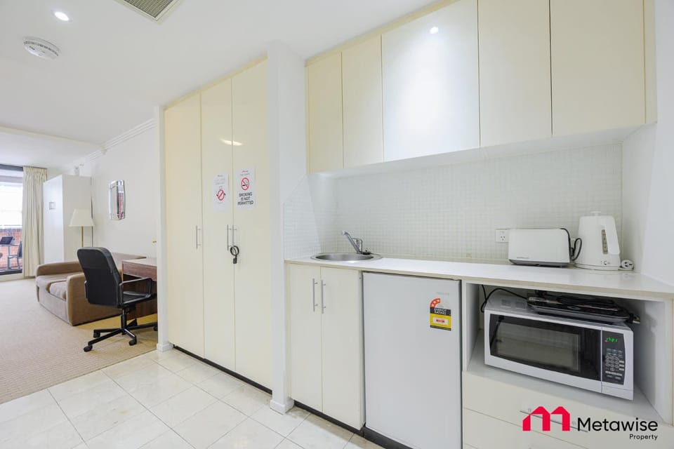 Kitchen or kitchenette, oven, toaster