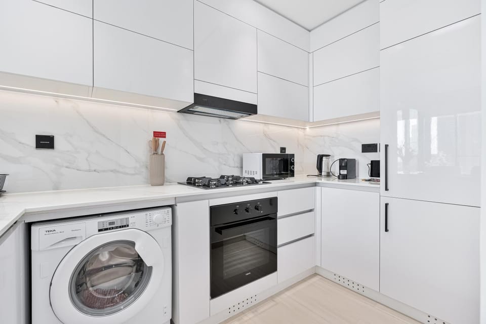 Kitchen or kitchenette, washing machine