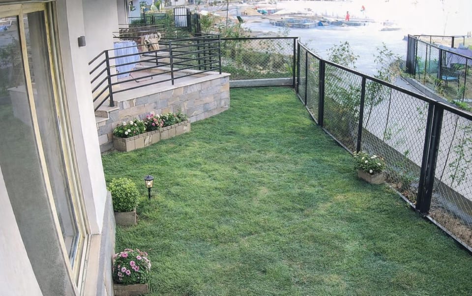Premium 4 Bedroom Furnished Home, with Garden ,Gated Compound Near Pyramids Apartment in Egypt