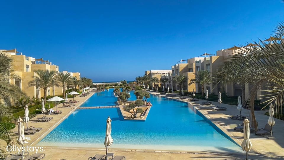 Property building, Property logo or sign, Natural landscape, Bird's eye view, View (from property/room), Pool view, Swimming pool, VIP