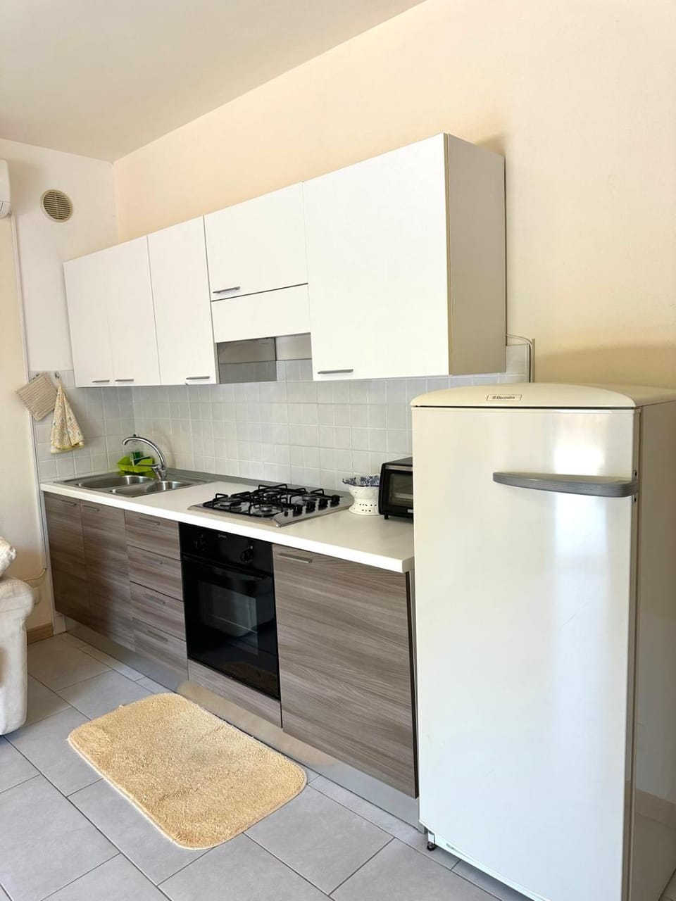 Kitchen or kitchenette, oven, stove