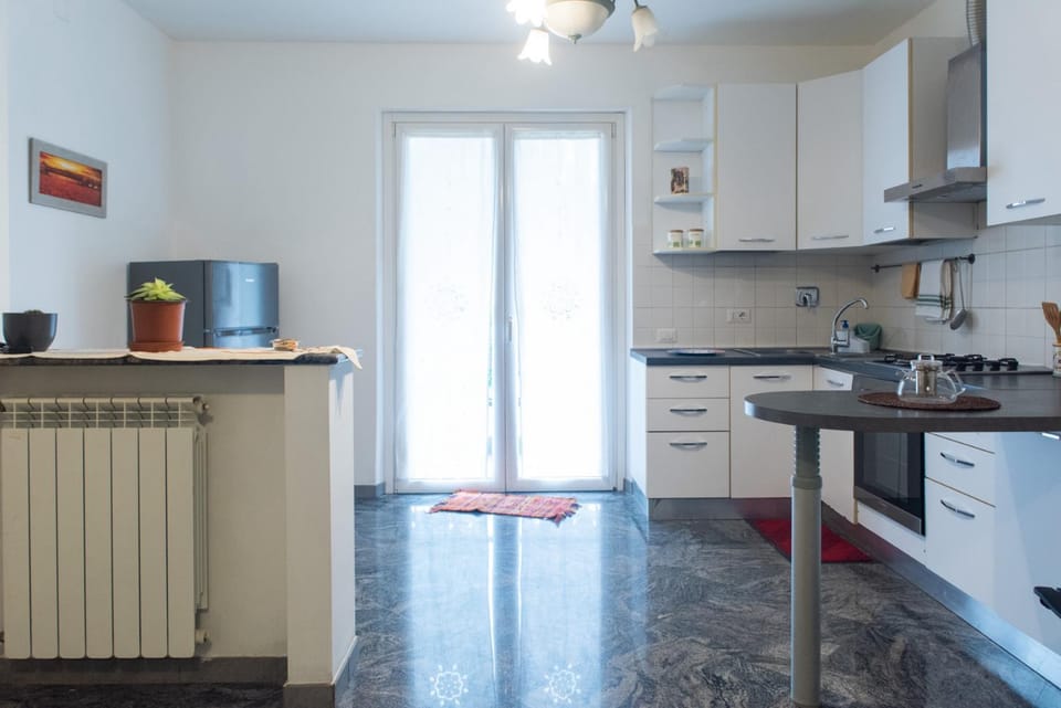 Kitchen or kitchenette, oven, stove