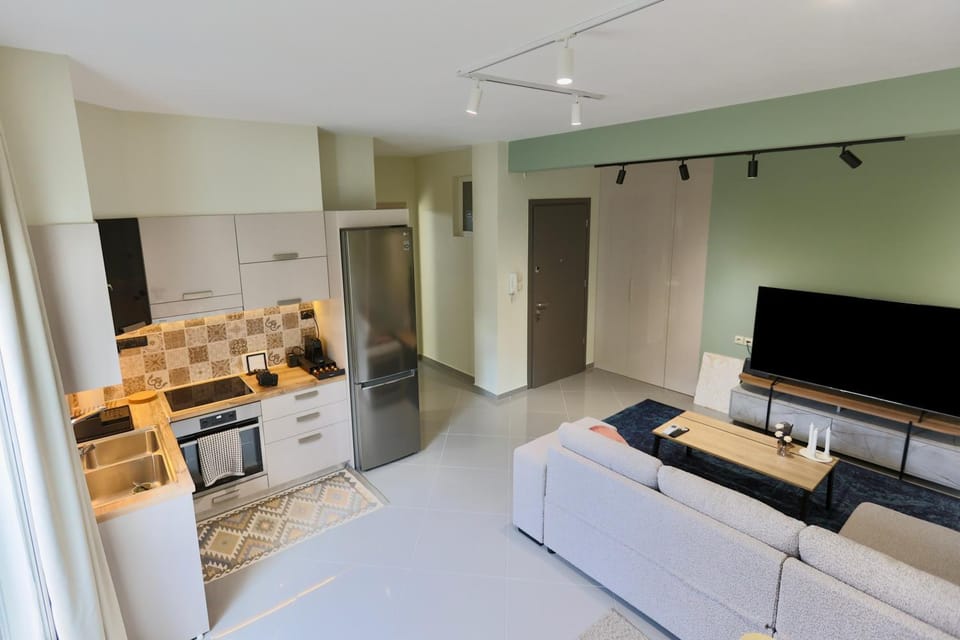 Kitchen or kitchenette, Living room, Seating area, oven