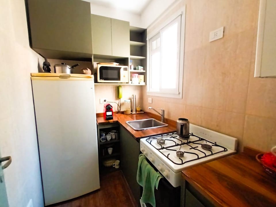 Kitchen or kitchenette, oven, stove