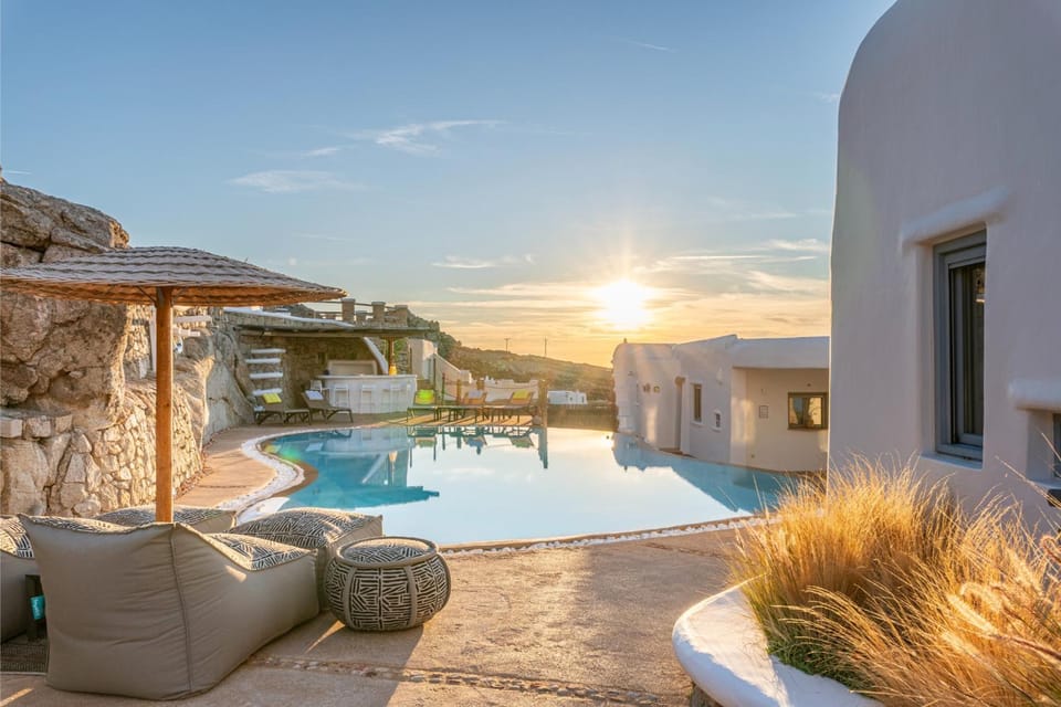 Property building, Patio, Day, Pool view, Swimming pool, Sunset, sunbed