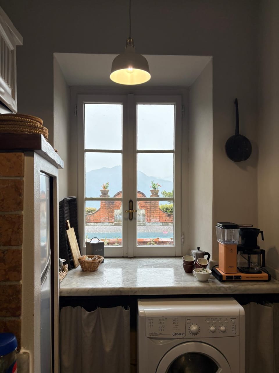 Kitchen or kitchenette, washing machine