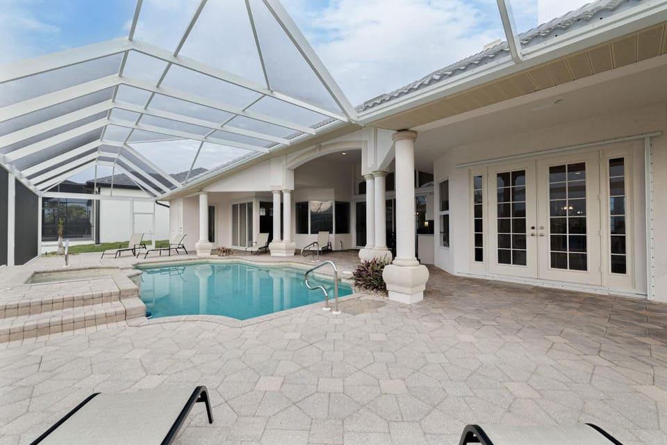 Waterfront Bliss Retreat Sailboat Access and Heated Pool House in Cape Coral