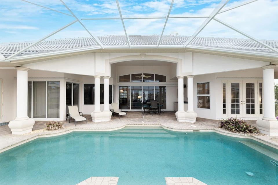 Waterfront Bliss Retreat Sailboat Access and Heated Pool House in Cape Coral