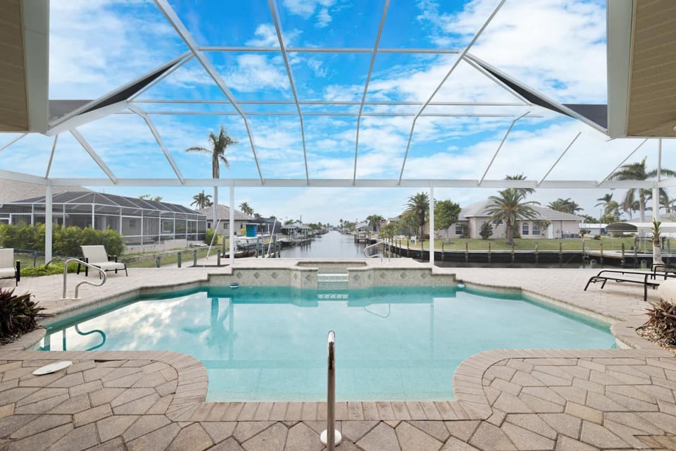 Waterfront Bliss Retreat Sailboat Access and Heated Pool House in Cape Coral