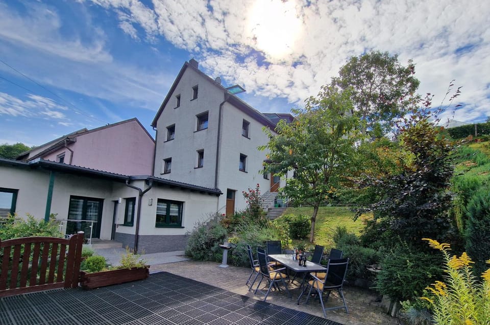 Property building, BBQ facilities, Seating area, Garden view