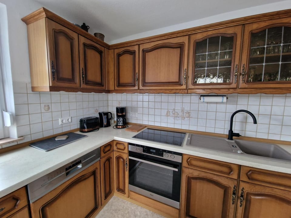Kitchen or kitchenette, dishwasher, stove, toaster, kitchen