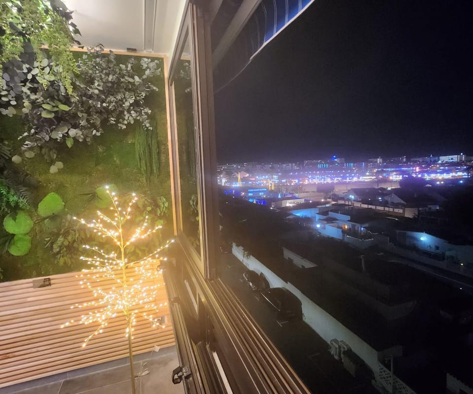 Night, View (from property/room), City view, Landmark view, Sea view