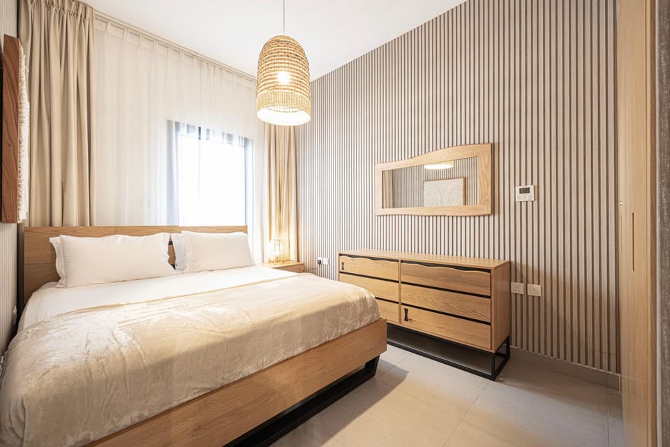 1BHK Poolview Apartment With Balcony - Timber Retreat Apartment in Al Sharjah