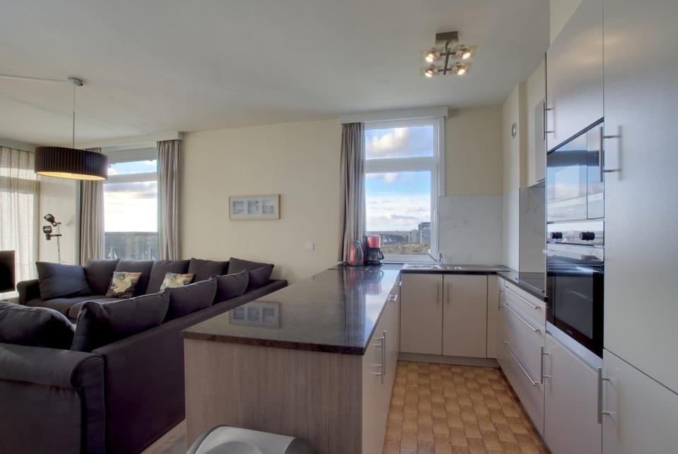 Kitchen or kitchenette, Living room, stove