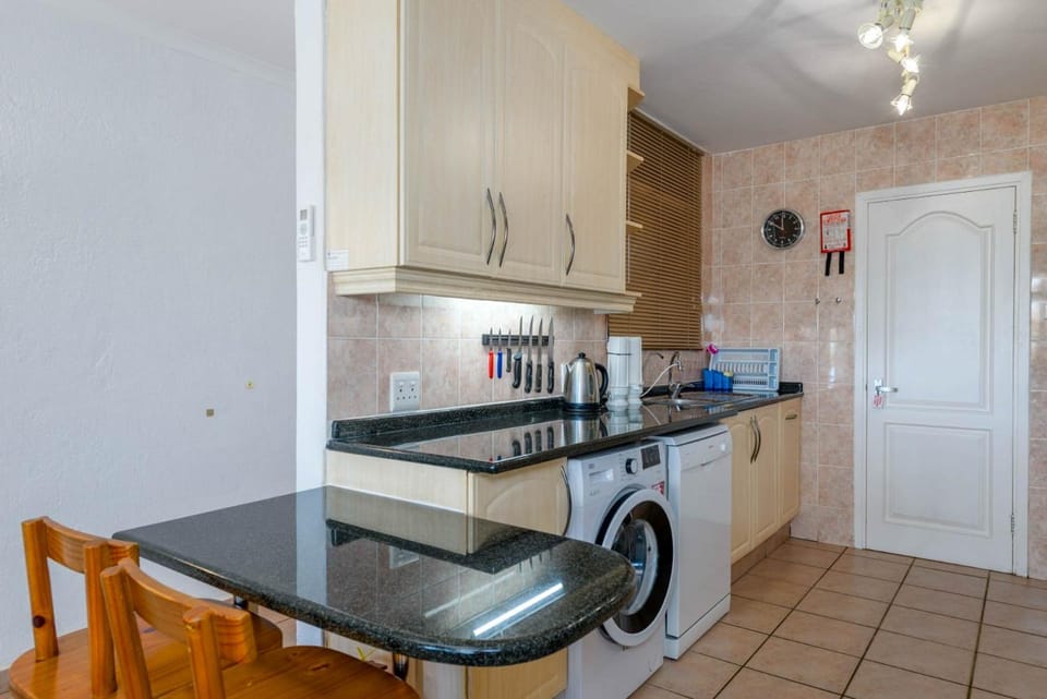 Kitchen or kitchenette, dishwasher, washing machine