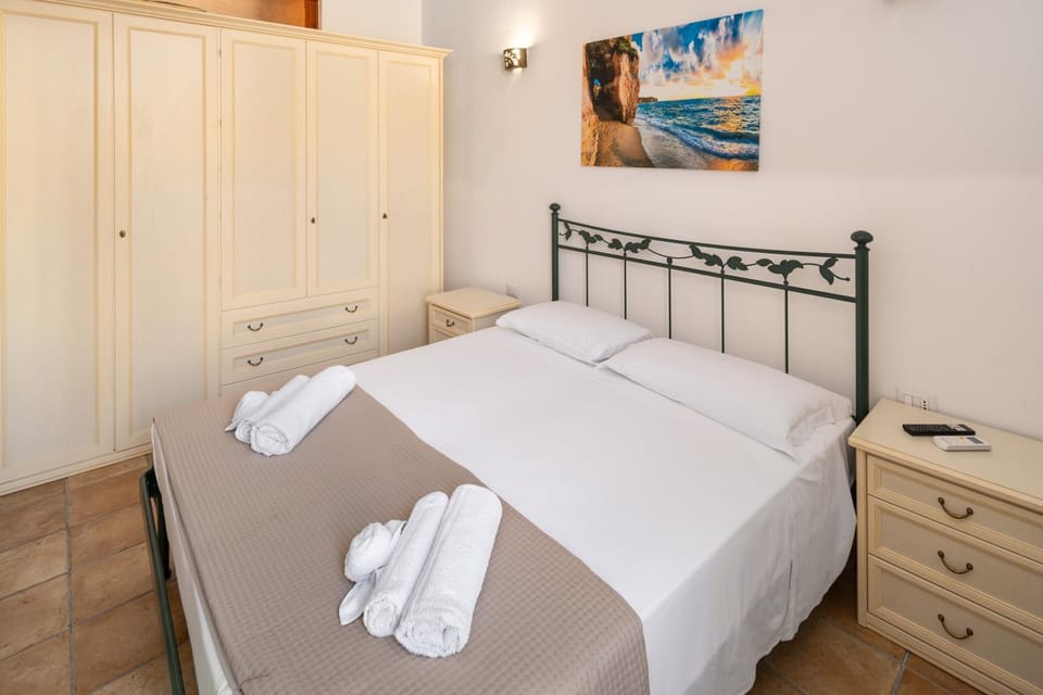 Bed, Photo of the whole room, Bedroom, towels, wardrobe