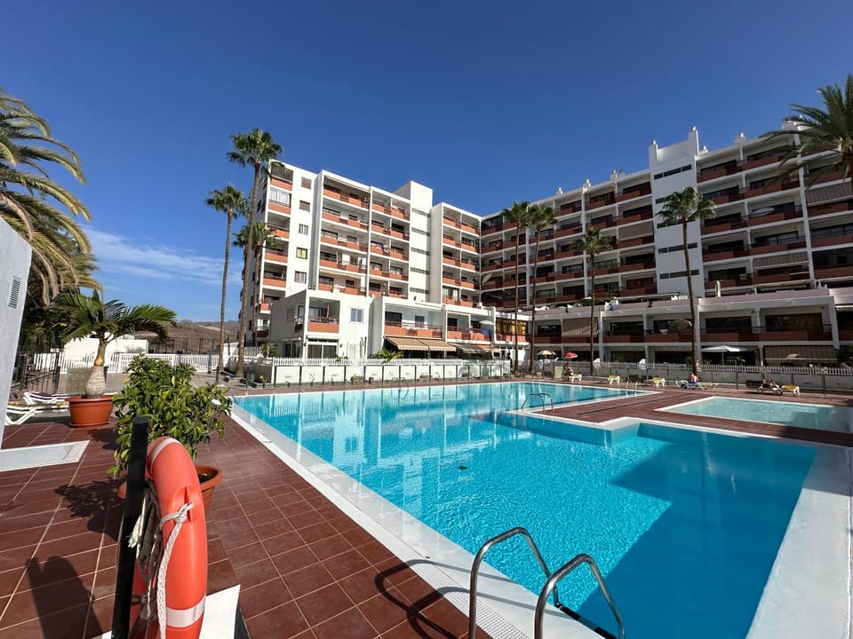 Property building, Pool view, Swimming pool, sunbed