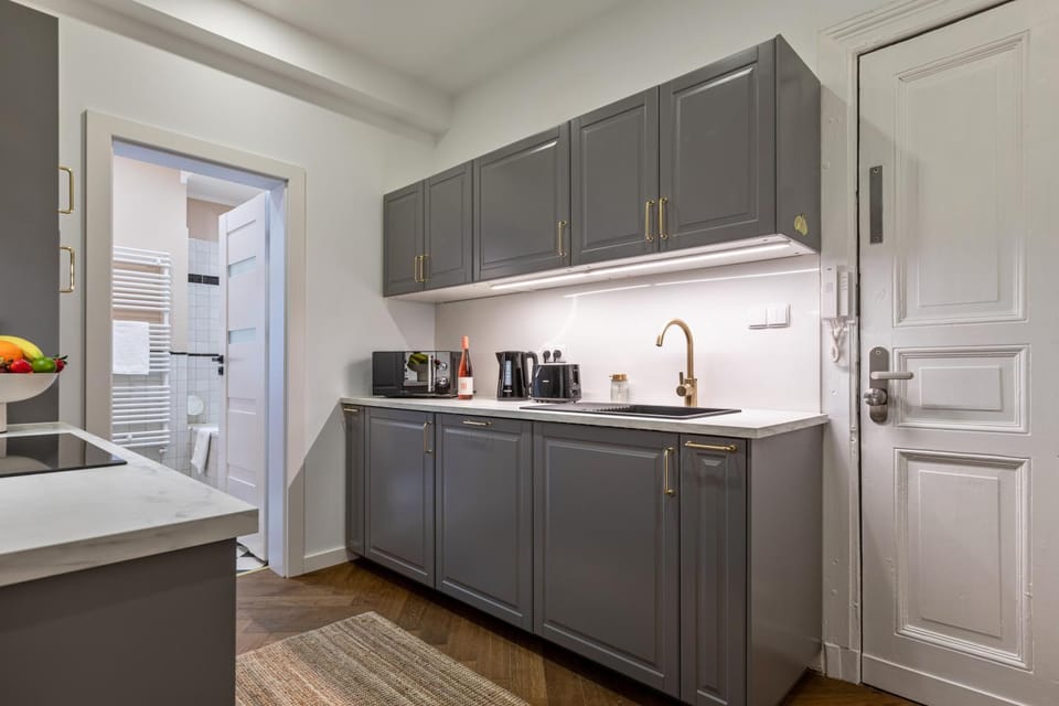 Coffee/tea facilities, Kitchen or kitchenette, dishwasher, oven, stove, washing machine, washing machine, washing machine