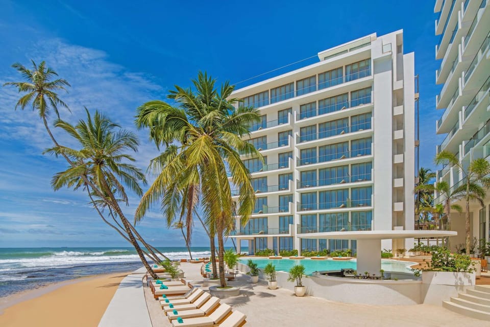 Property building, Beach, Sea view, Swimming pool, sunbed