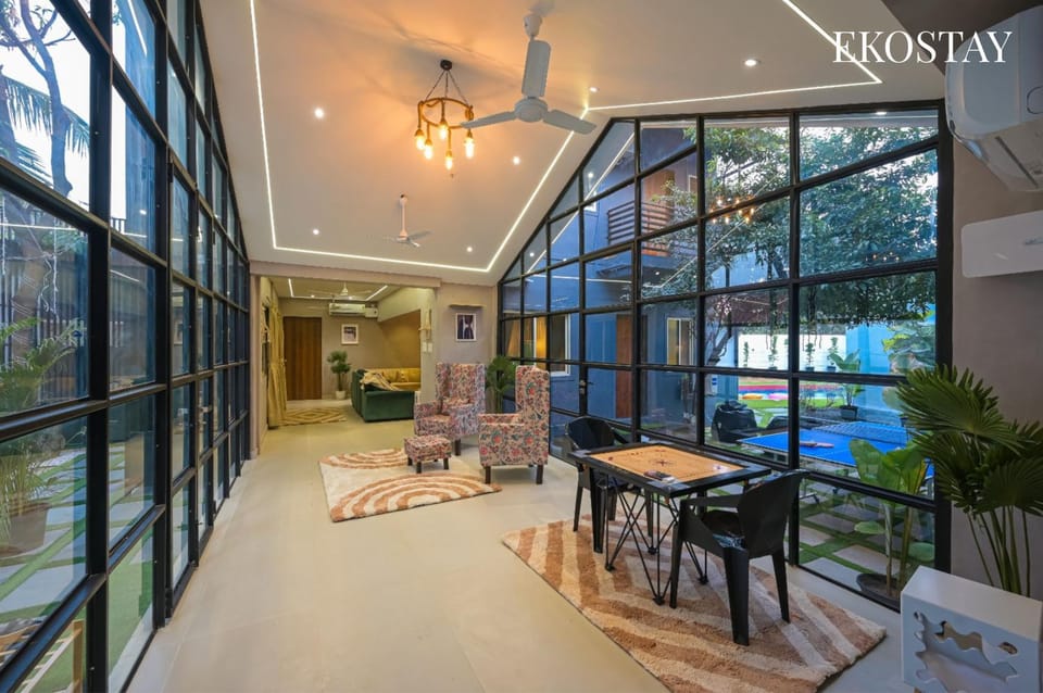 Patio, Living room, Seating area, Pool view, Swimming pool, sunbed