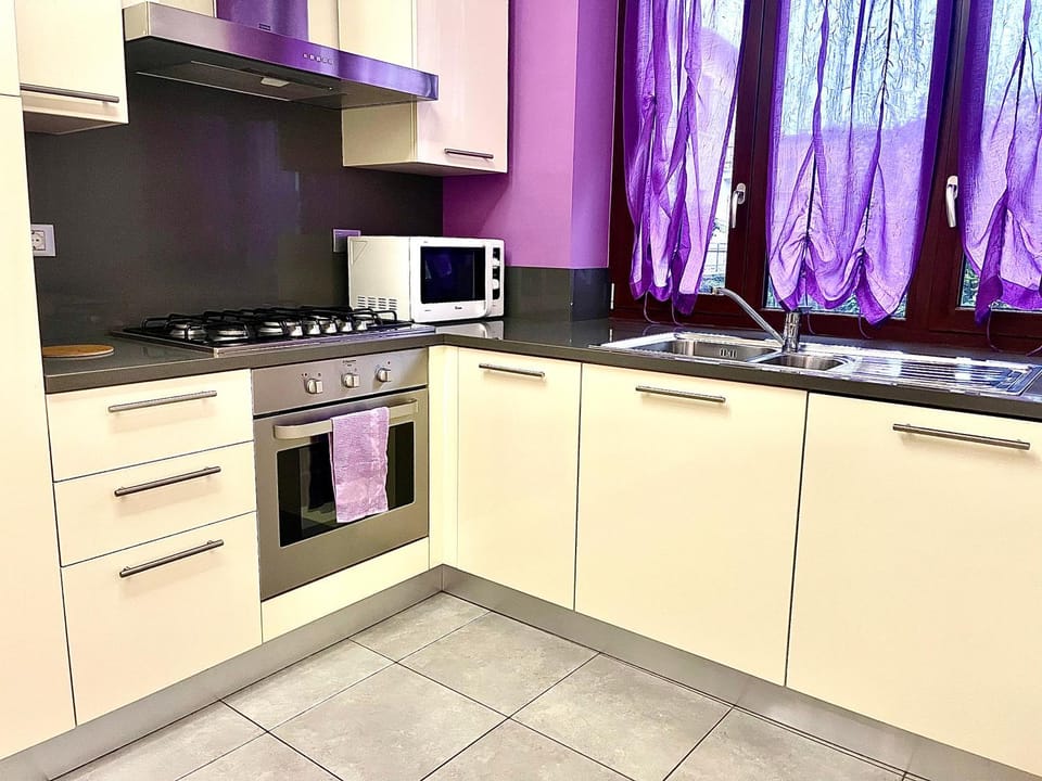 Kitchen or kitchenette, dishwasher, oven, stove, toaster