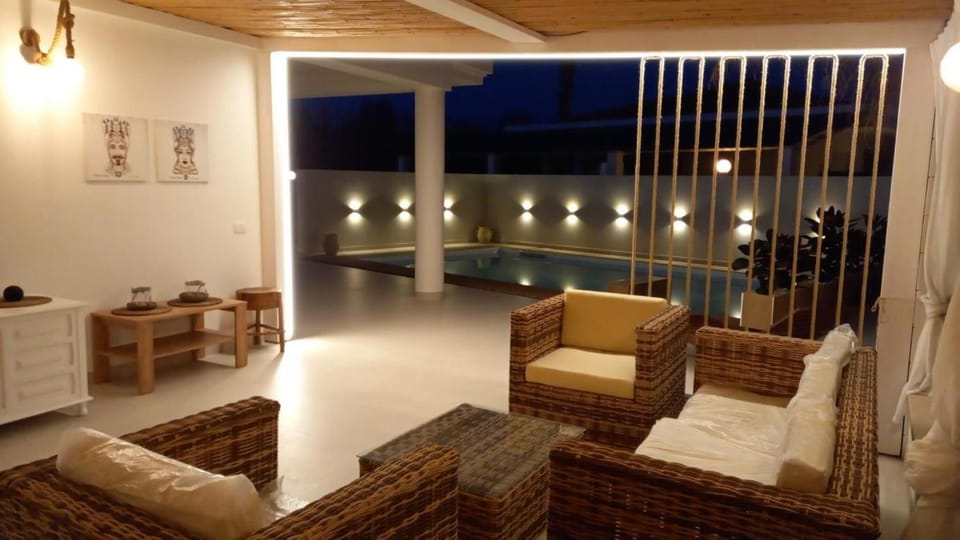 Property building, Living room, Swimming pool