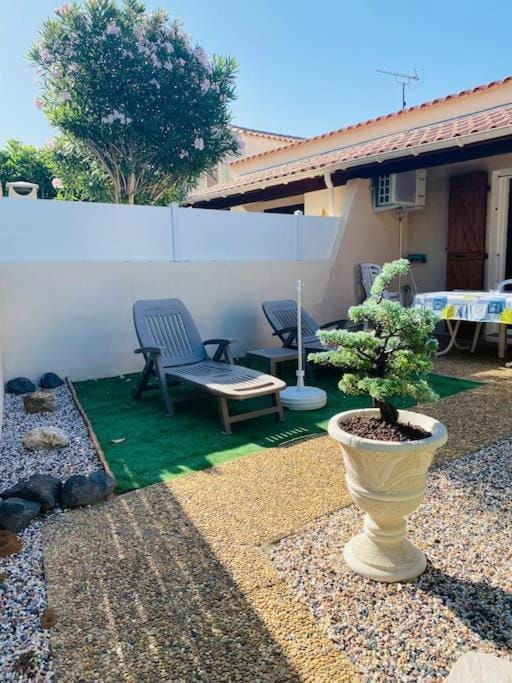 AGENCE JF IMMO - Villa climatisee 5 pers proche plage avec terrasse et parking V0387 House in Vias
