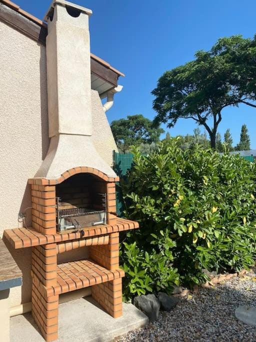 AGENCE JF IMMO - Villa climatisee 5 pers proche plage avec terrasse et parking V0387 House in Vias