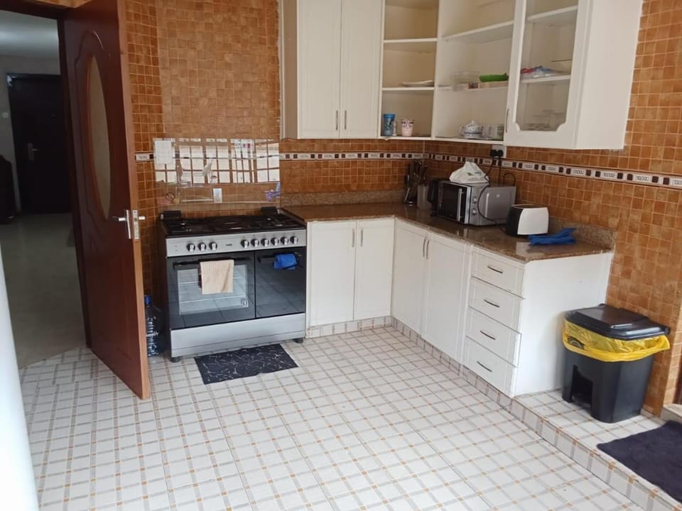 Kitchen or kitchenette, oven, stove, toaster