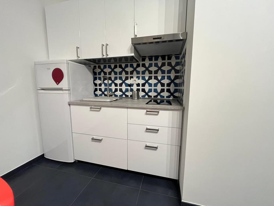 Kitchen or kitchenette, stove