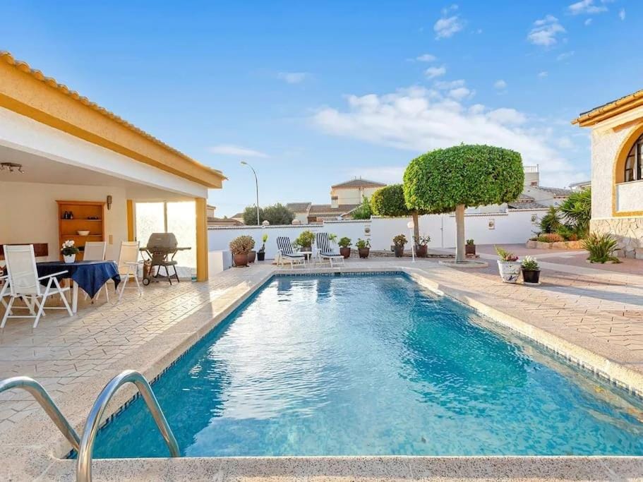 Patio, Day, Pool view, Swimming pool, Swimming pool, sunbed
