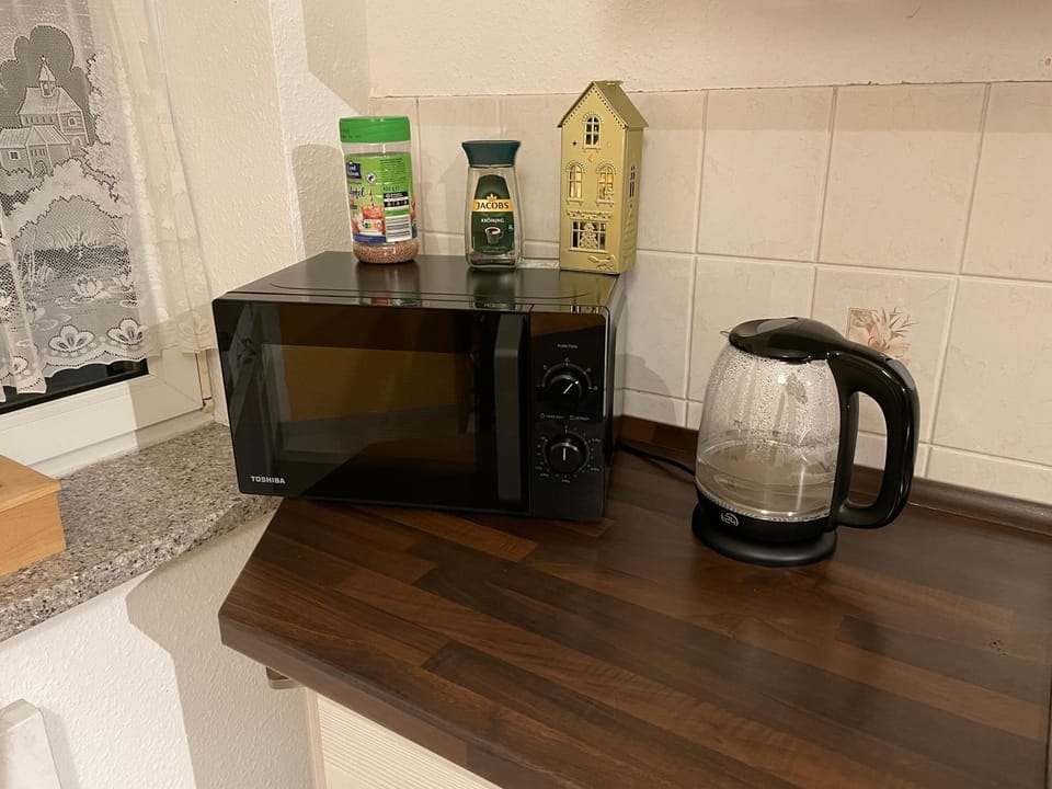 Kitchen or kitchenette, microwave