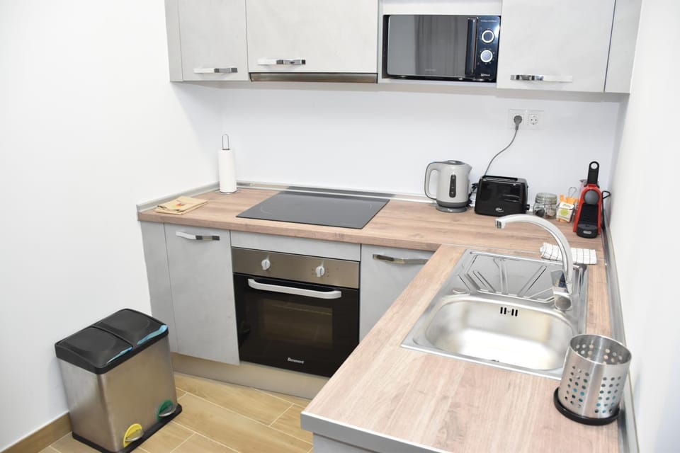 Kitchen or kitchenette, stove