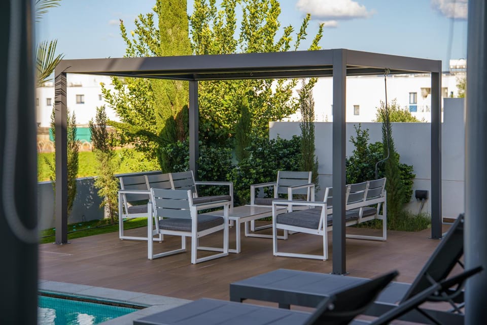 Patio, Day, Dining area, Garden view, Pool view