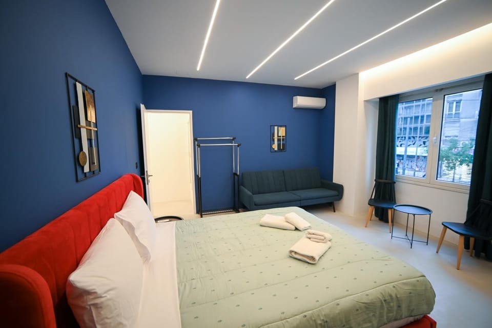 Bed, Photo of the whole room, Seating area, Bedroom, towels, wardrobe, air conditioner