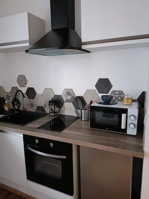 Kitchen or kitchenette, stove