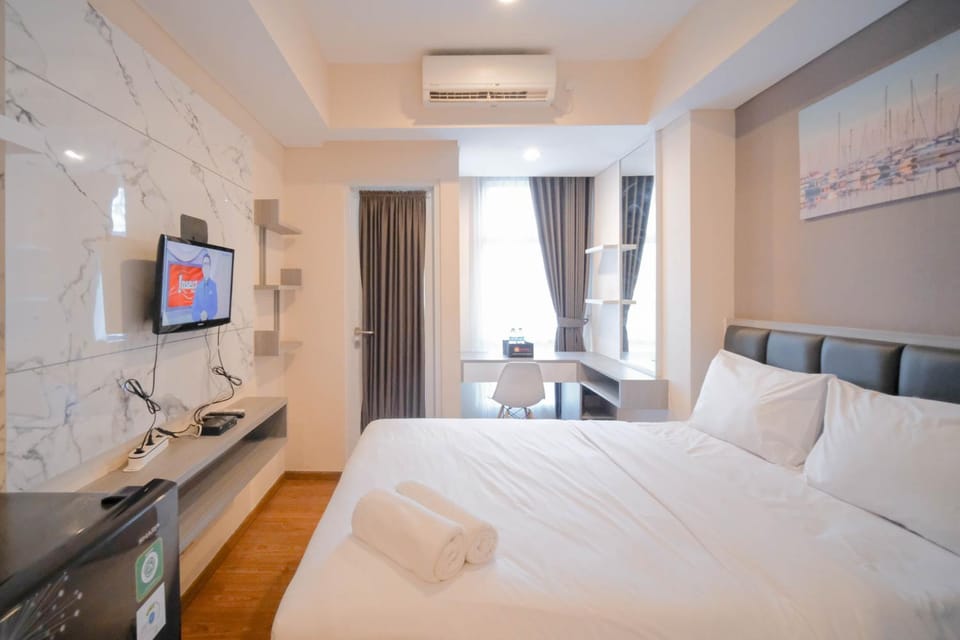 Compact and Comfortable Living Studio at Grand Sungkono Lagoon Apartment By Travelio Apartment in Surabaya