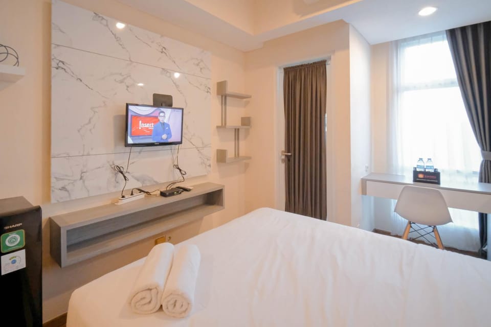 Compact and Comfortable Living Studio at Grand Sungkono Lagoon Apartment By Travelio Apartment in Surabaya