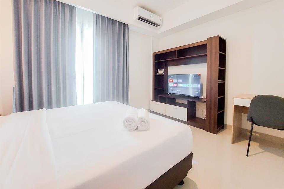 Comfort Living 1BR without Living Room at Bintaro Embarcadero Apartment By Travelio Apartment in Jakarta