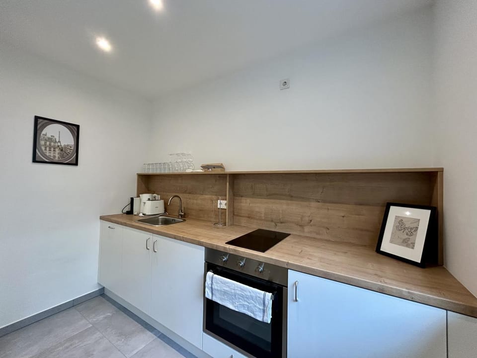 Kitchen or kitchenette, stove, toaster