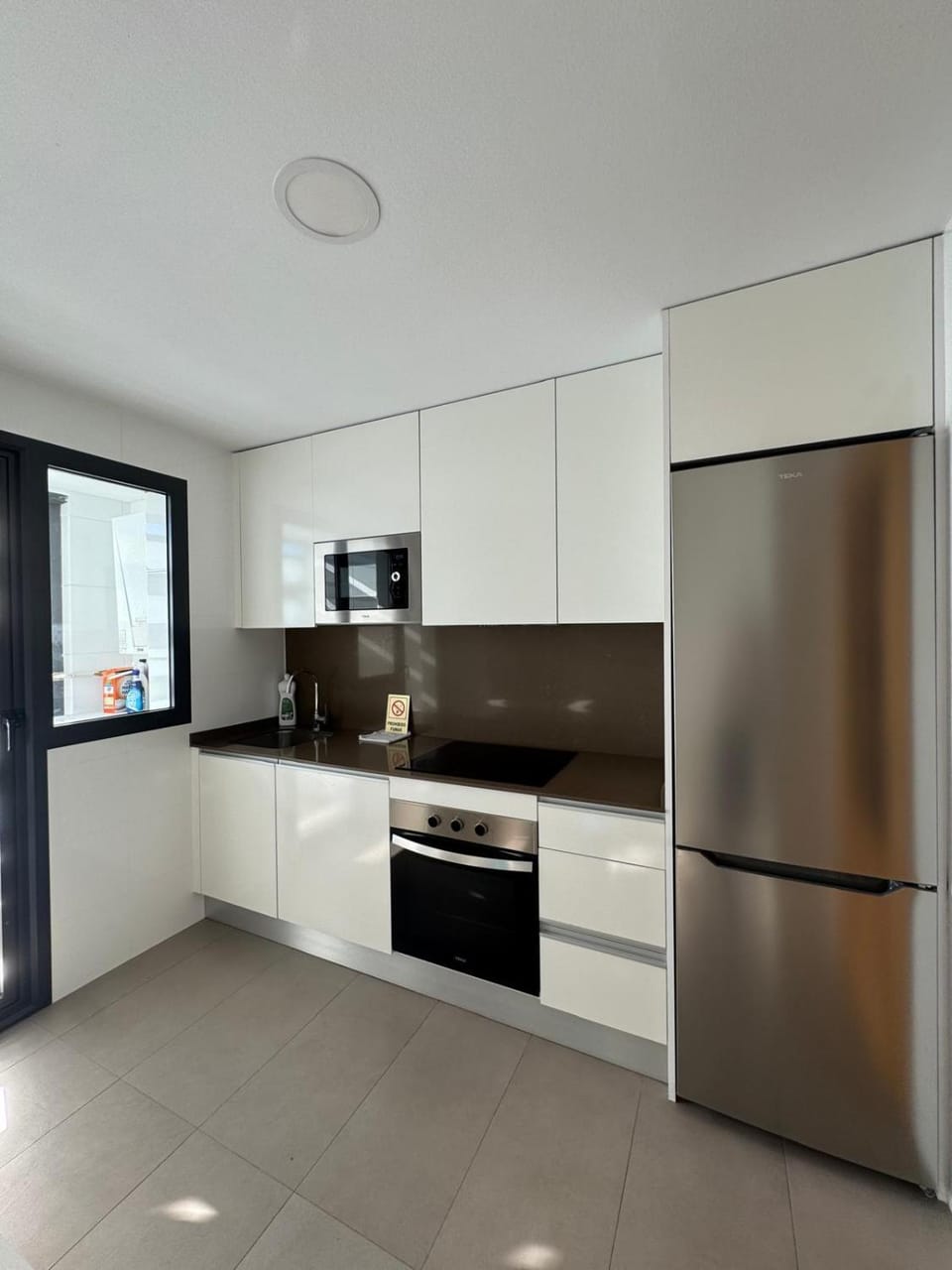Kitchen or kitchenette, oven