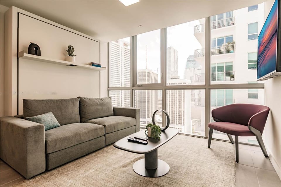 TV and multimedia, Living room, Seating area, City view, air conditioner