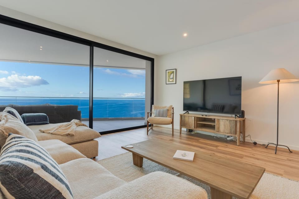 Communal lounge/ TV room, Living room, Seating area, Sea view