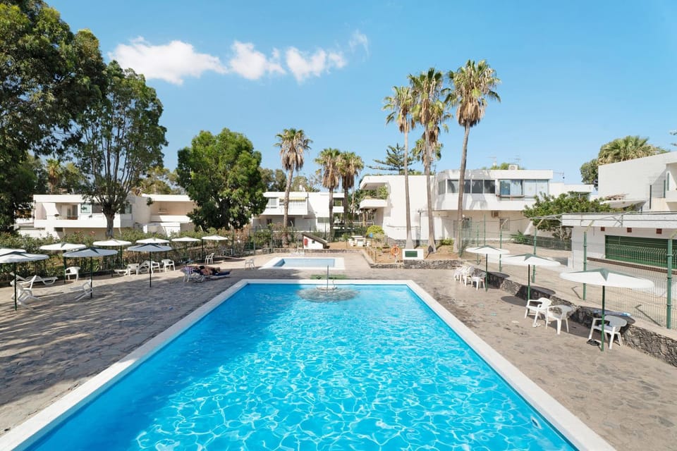 Property building, Living room, Swimming pool