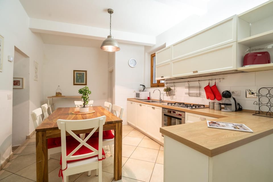 Kitchen or kitchenette, Dining area, dishwasher, stove, toaster