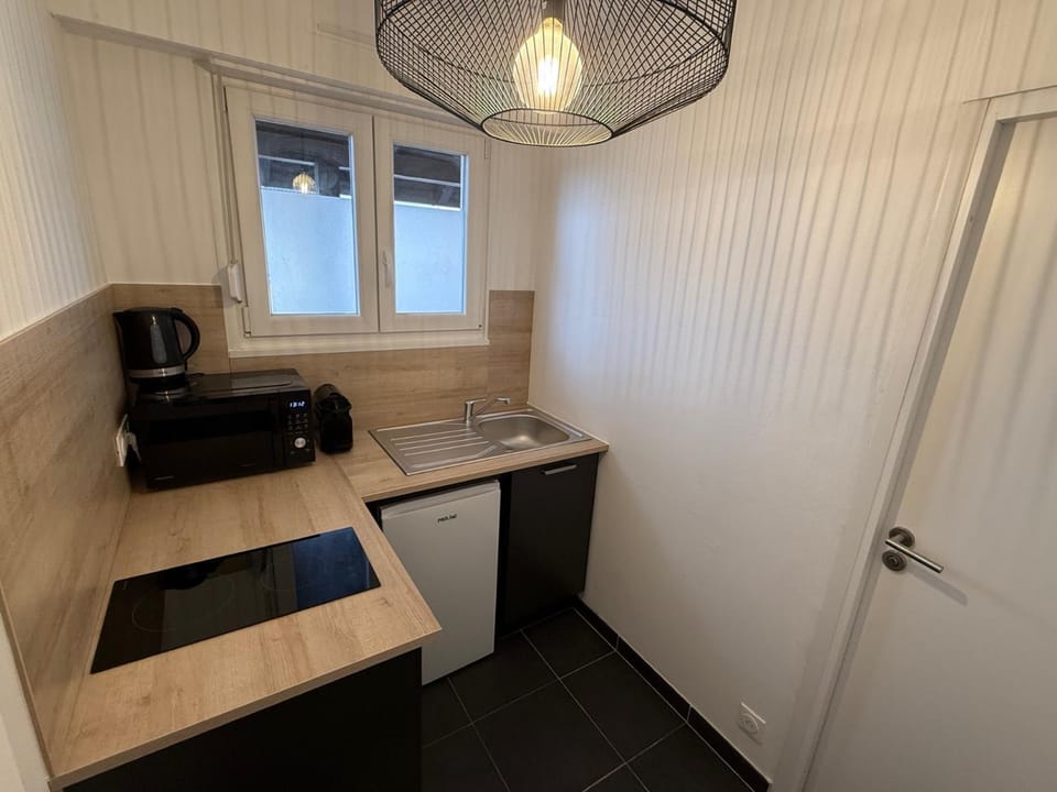Kitchen or kitchenette, stove