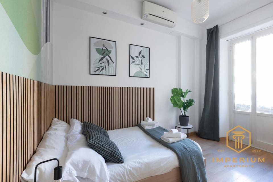 Bed, Photo of the whole room, Bedroom, towels, air conditioner