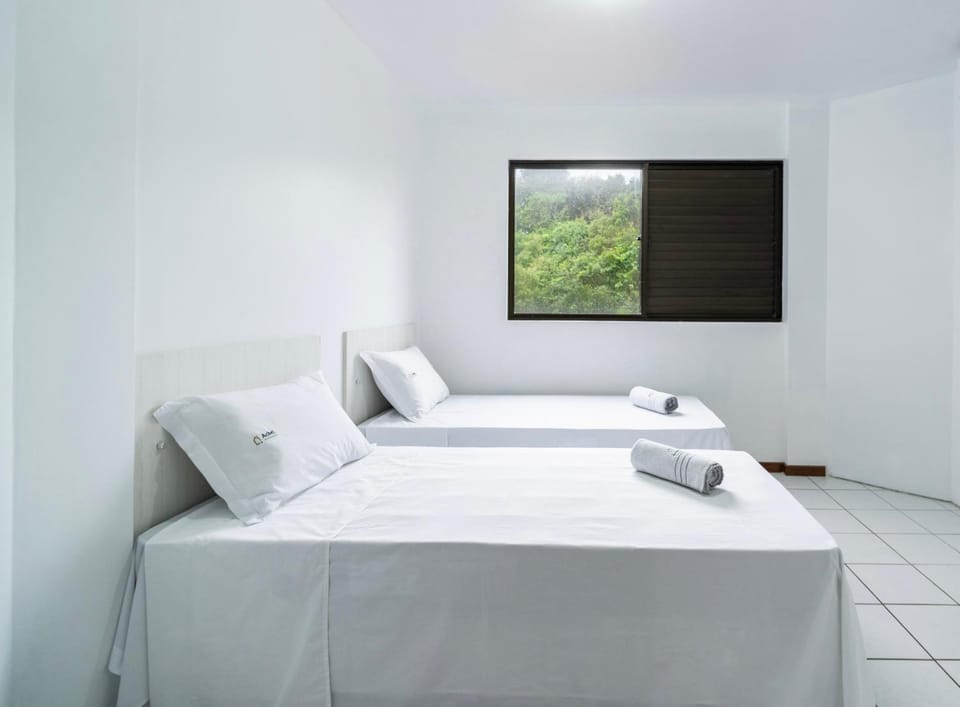 Apto Luar 2Q 10 metros da praia by Achei Floripa Apartment in Florianopolis