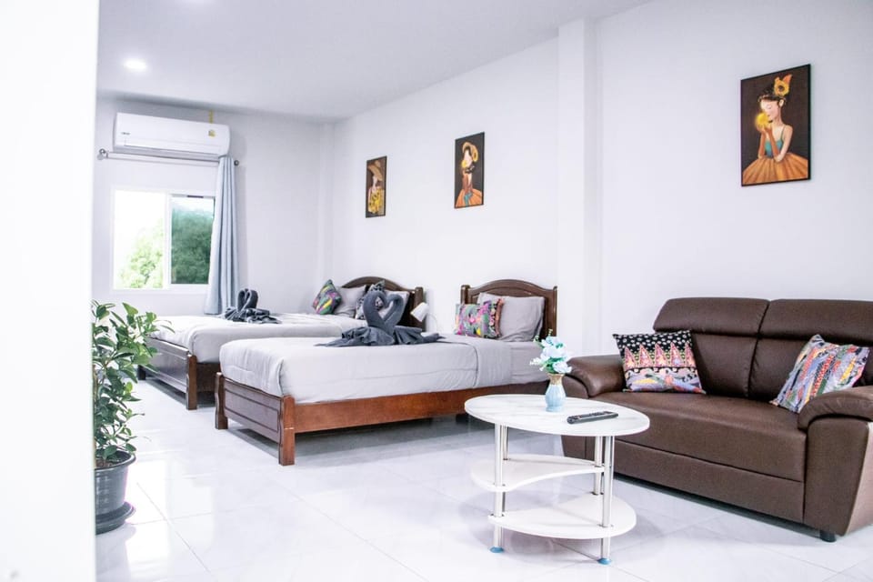 Bed, Living room, Seating area, Bedroom